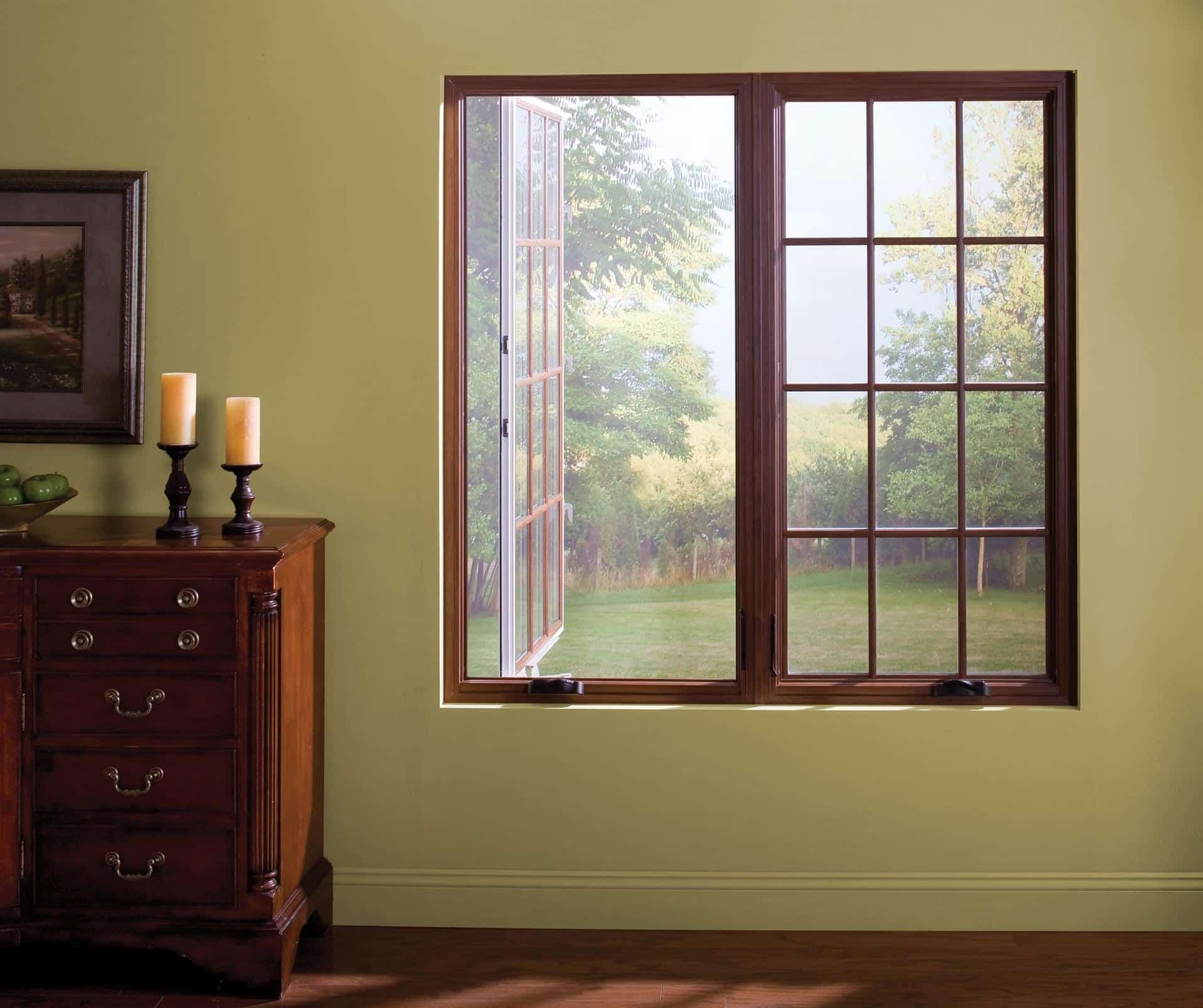 Twin Casement windows with brown frames by Outback Deck.