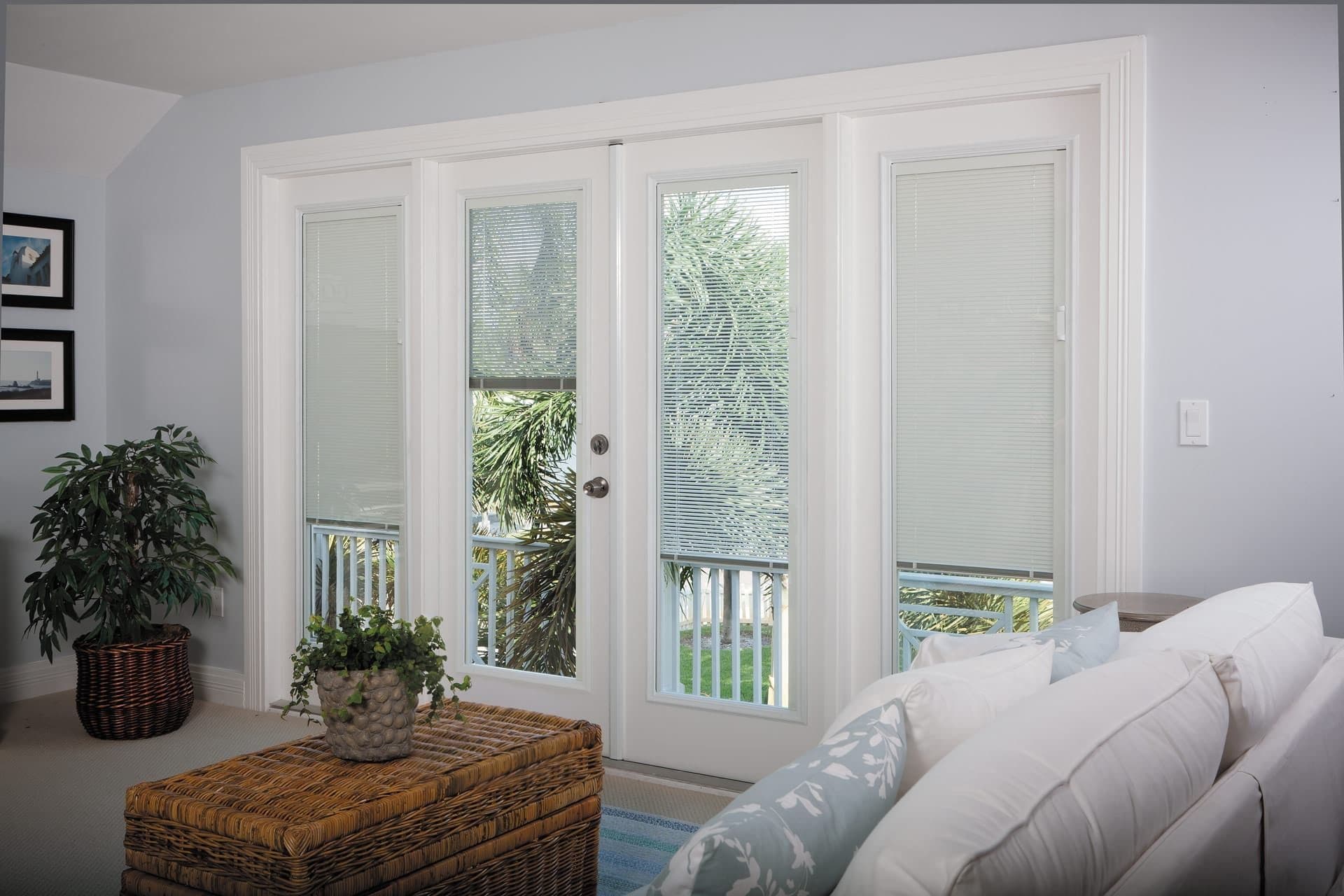 White patio doors with built-in blinds.