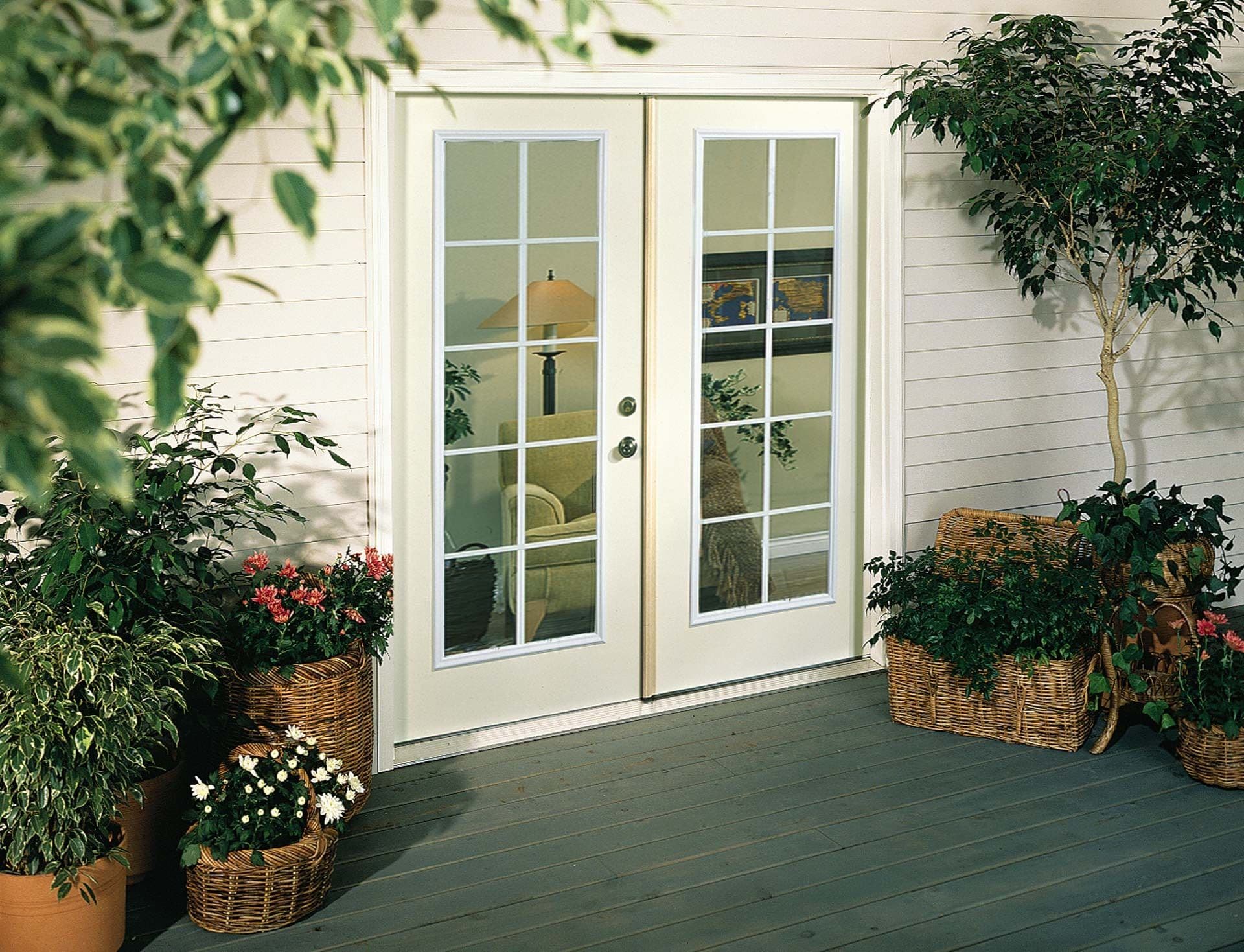 White French patio doors lead to a deck.