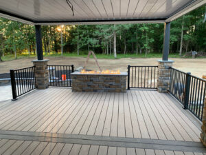 a newly installed composite deck with patio cover